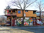 Cabane dans les arbres du mur de Berlin