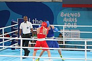 Deutsch: Boxen bei den Olympischen Jugendspielen 2018 Tag 12, 18. Oktober 2018 - Finale im Leichten Weltergewicht Jungen – Ilia Popov (Russland, rot) schlägt Talgat Shaiken (Kasachstan, blau) 4-1; Ringrichter ist James Beckles (Trinidad und Tobago). English: Boxing at the 2018 Summer Youth Olympics on 18 October 2018 – Final Light Welterweight Boys Bout - Ilia Popov (Rusia, rojo) supera a Talgat Shaiken (Kazajstán, azul) 4-1; Referee is James Beckles (Trinidad and Tobago). Español: Boxeo en los Juegos Olímpicos Juveniles de Verano de 2018 en 18 de octubre de 2018 - Chicos de peso welter ligero final: Ilia Popov (Uzbekistán, roja) le gana a Talgat Shaiken (Egipto, azul) 4-1; El árbitro es James Beckles (Trinidad y Tobago).