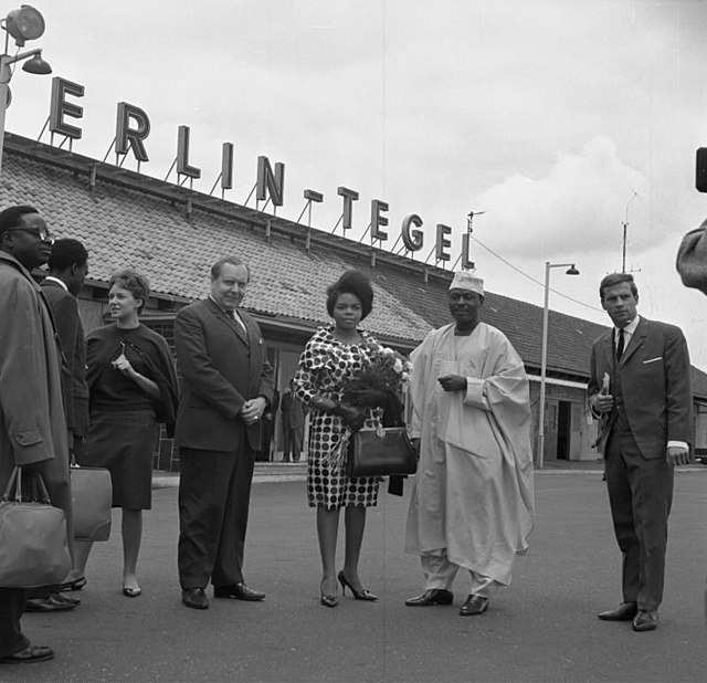 Arrival at Berlin Tegel of a former Nigerian information minister on an official visit to West Berlin on 20 June 1963 (note the original terminal on t