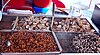 Seashells and marinated silkworms are good snack food for Busanites