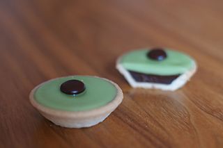 Carac (pastry) Swiss tart of green fondant over chocolate ganache in a shortbread crust