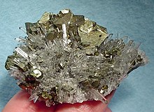 Showy specimen of chalcopyrite in quartz needles, from the old Groundhog Mine, between Bayard and the Chino mine.