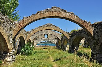 The arches with Gouvia Bay in the background Corfu Gouvia Venetian Shipyard R01.jpg