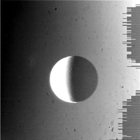 The Cassini camera was pointing toward Dione at a distance of approximately 548,210 kilometers. The image was taken using the CL1 and CL2 filters on May 17, 2010. Damaged N00153918.jpg