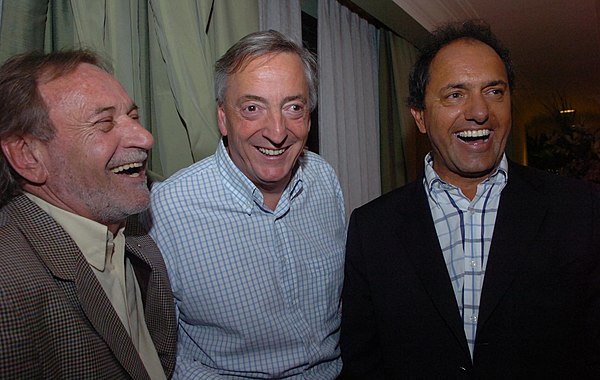 Scioli's running mate, Alberto Balestrini, President Kirchner and Scioli celebrate the victory of the Scioli-Balestrini ticket in the 2007 race for th