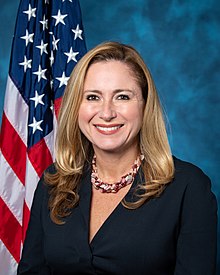 Debbie Mucarsel-Powell, first South American immigrant member of Congress, elected in 2018 Debbie Mucarsel-Powell, official portrait, 116h Congress.jpg