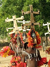 The costumes in Find Your Way Back allude to the Dogon people, who wear Kanaga masks during dama, a ceremony of mourning