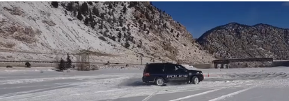 Police driver being trained on a frozen lake Driving on Frozen Lake.png