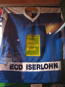 The 1987 ECD Iserlohn shirt with Gaddafi's Green Book advertisement ECD-Trikot Gruenes Buch.JPG
