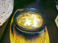 Fahsa is a famous Yemeni dish, containing beef or lamb meat cooked in a stony pot called Madara.
