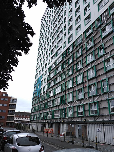 File:Flammable cladding being stripped off Horatia House.jpg