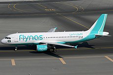 Flynas A320-200 VP-CXR DXB 2014-11-22.jpg