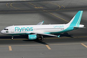 Flynas A320-200 VP-CXR DXB 2014-11-22.jpg