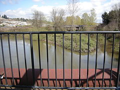 View from Fort Dent Pedestrian Bridge: looking downstream on the Duwamish River and, at right, upstream on the Black River