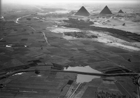 Aerial view from north of cultivated Nile valley with the pyramids in the background