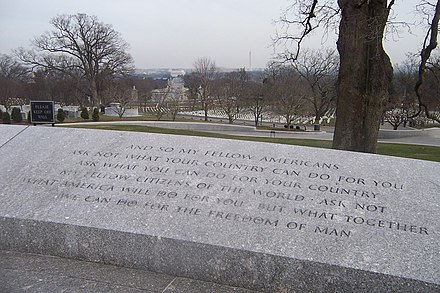 The most famous passage from the inaugural address is etched in stone at Kennedy's gravesite in Arlington National Cemetery, with the Lincoln Memorial and Washington Monument in the background.