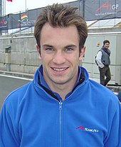 Nicolas Lapierre (pictured in 2007) won the Grand Prix overall after James Courtney picked up a puncture that put him into the wall at the Melco hairpin on lap eleven. Lapierre nicolas.JPG