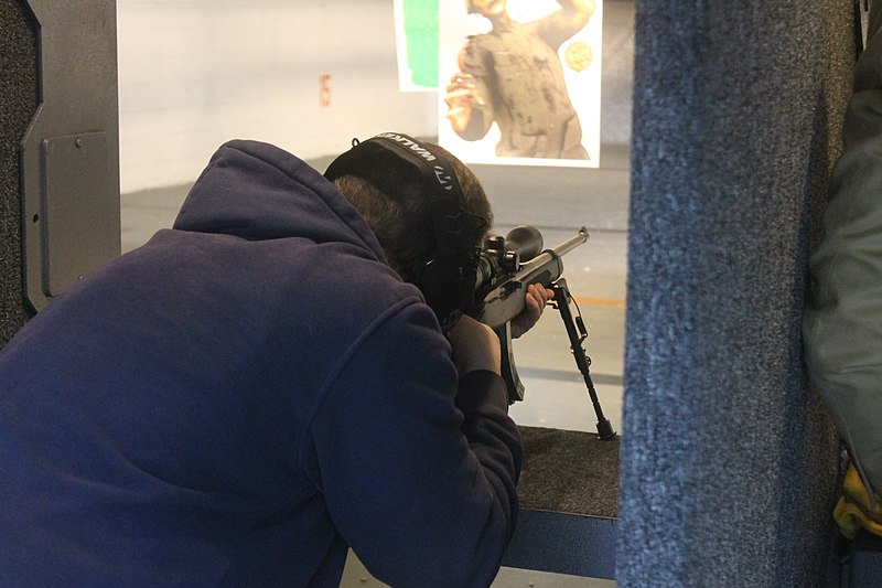 File:Man with .22 LR Rifle at Shooting Range.jpg