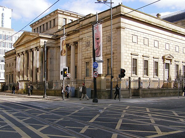 The Grade I-listed Manchester Art Gallery (1824) and the Grade II*-listed Athenaeum (1837) in Manchester