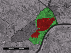 The town centre (red) and the statistical district (light green) of Tiel in the municipality of Tiel.