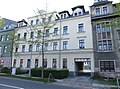 Apartment building in closed development with front garden