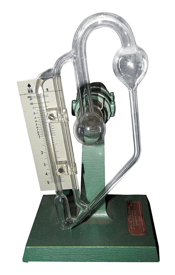 A glass McLeod gauge, drained of mercury