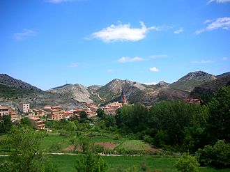 View of Molinos; the arid Sierra de Caballos, part of the Iberian System, rises behind the town Molinos50.JPG