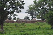 Traditional round mud and thatch houses forming a family compound near Tamale, Ghana Mud and thatch houses.JPG