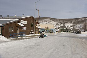 A Street is the main street of the Nenana townsite. The larger buildings seen in this view, from left to right: the Nenana Civic Center (which doubles as headquarters for the Nenana Ice Classic), Coghill's Store and the Nenana Depot of the Alaska Railroad.