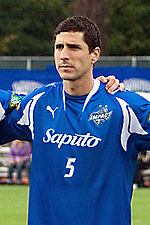 Final club captain Nevio Pizzolito (2008 image) in Impact colours.