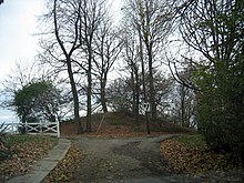 Norwood Mound was constructed by people of the prehistoric Adena culture and was likely used for religious ceremonies and smoke signaling Norwood ohio indian mound.jpg