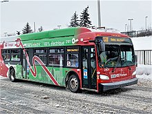 Electric bus on a route test prior to officially beginning service, pictured in January 2022 OC Transpo 2101 mosbo6.jpg