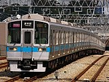 地下鉄千代田線と直通運転する運用に入っていた頃の1000形 運行番号を表示している （2005年9月16日 / 喜多見駅）