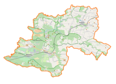 Mapa konturowa powiatu olkuskiego, po prawej znajduje się punkt z opisem „Klasztor Norbertanekw Imbramowicach”