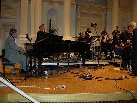 Magic City Jazz Orchestra Founding Director Ray Reach (at the piano), performing at Samford University with the SuperJazz Big Band, 2007. Ray Reach and the SuperJazz Big Band.jpg