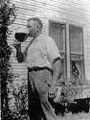 English: Robert E. Howard posing with a sip of beer. Sent to E. Hoffmann Price. The original caption on the back of the photo says, "Schlitz didn't pay a penny for this endorsement - and probably won't. R.E.H."