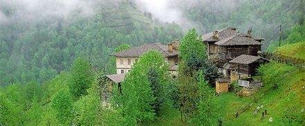 A hamlet with traditional local architecture up on lush and misty Kaçkar Mountains/Pontic Alps