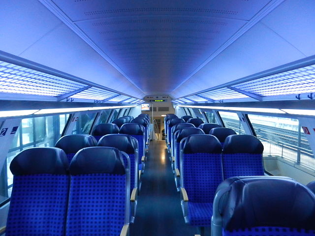 A 2007 double-deck carriage with bluish LED lighting. The carriages are the first of their kind in the world to implement all lighting with LEDs.