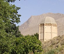 The tomb is located on top of a hill adjacent to Damavand Shebli1.jpg