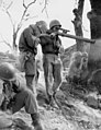 Soldier firing a 57mm M18A1 recoilless rifle. Korea, 5 September 1951.