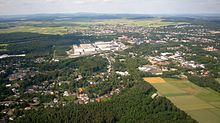 Stadtallendorf trägt wegen der Lage im Herrenwald den Beinamen „Junge Stadt im Grünen“.