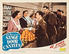 Katharine Cornell, Aline MacMahon and Dorothy Fields serve soldiers played by Lon McCallister and Michael Harrison in the film Stage Door Canteen (1943)