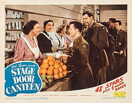 Cornell, Aline MacMahon and Dorothy Fields serve soldiers played by Lon McCallister and Michael Harrison in Stage Door Canteen (1943)