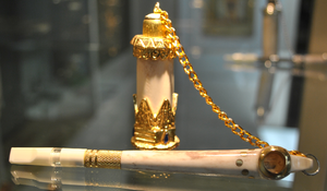 Stone Medwakh Pipe with Gold Finishing and Chanta.png