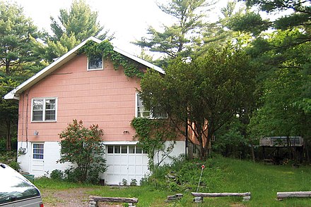 The "Big Pink" house in 2006. "Big Pink" was the house where Bob Dylan and the Band's Basement Tapes were recorded, and the music from the Band album Music From Big Pink was written.
