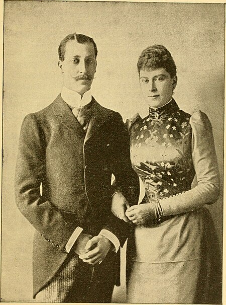 Tập_tin:The_Duke_of_Clarence_and_Avondale_with_Princess_Victoria_May_of_Teck.jpg