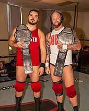 The North defended the World Tag Team Championship against The Rascalz at Sacrifice. The North with Impact belts-1.jpg