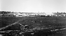 Palmerston North Square 1878 The Square 1878 towards Main Street West from junction with Fitzherbert Ave, Palmerston North.jpg