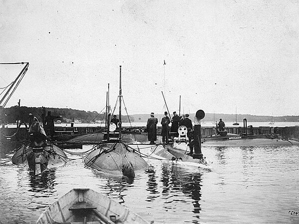 Plunger, Adder, Moccasin, Porpoise, and Shark at New Suffolk, New York circa 1903.