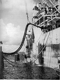 USS Ponaganset taking on water at Balusoa Water Point, Samar, Philippines, (in 1944 or 1945). USS Ponaganset.jpg